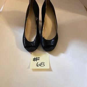 Calvin Klein black snake embossed heel size 8.5. Heel height 3 inches.